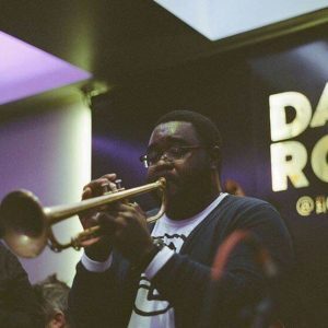 Brady Lewis plays trumpet at The Dark Room
